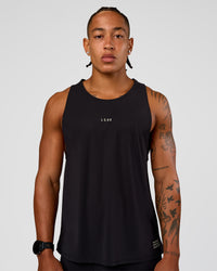 Man wearing Cadence Run Club Script Values Tank - Black-Alloy | Model:Malebo | Size:M