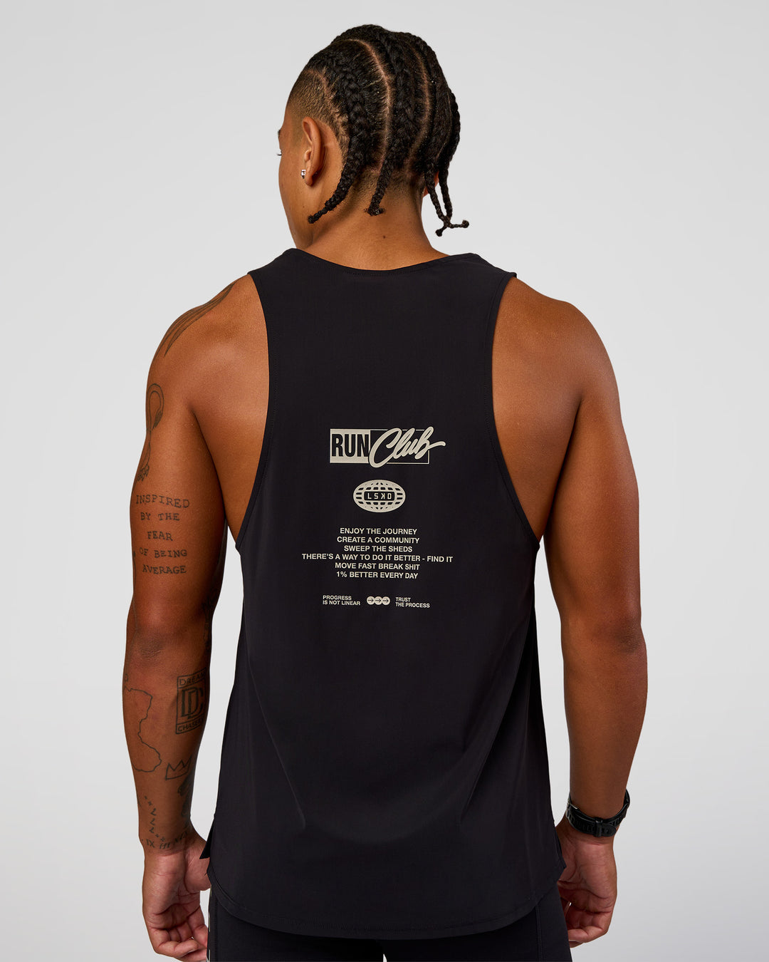 Man wearing Cadence Run Club Script Values Tank - Black-Alloy | Model:Malebo | Size:M