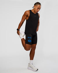 Man wearing Cadence Run Club Script Values Tank - Black-Palace Blue | Model:Malebo | Size:M