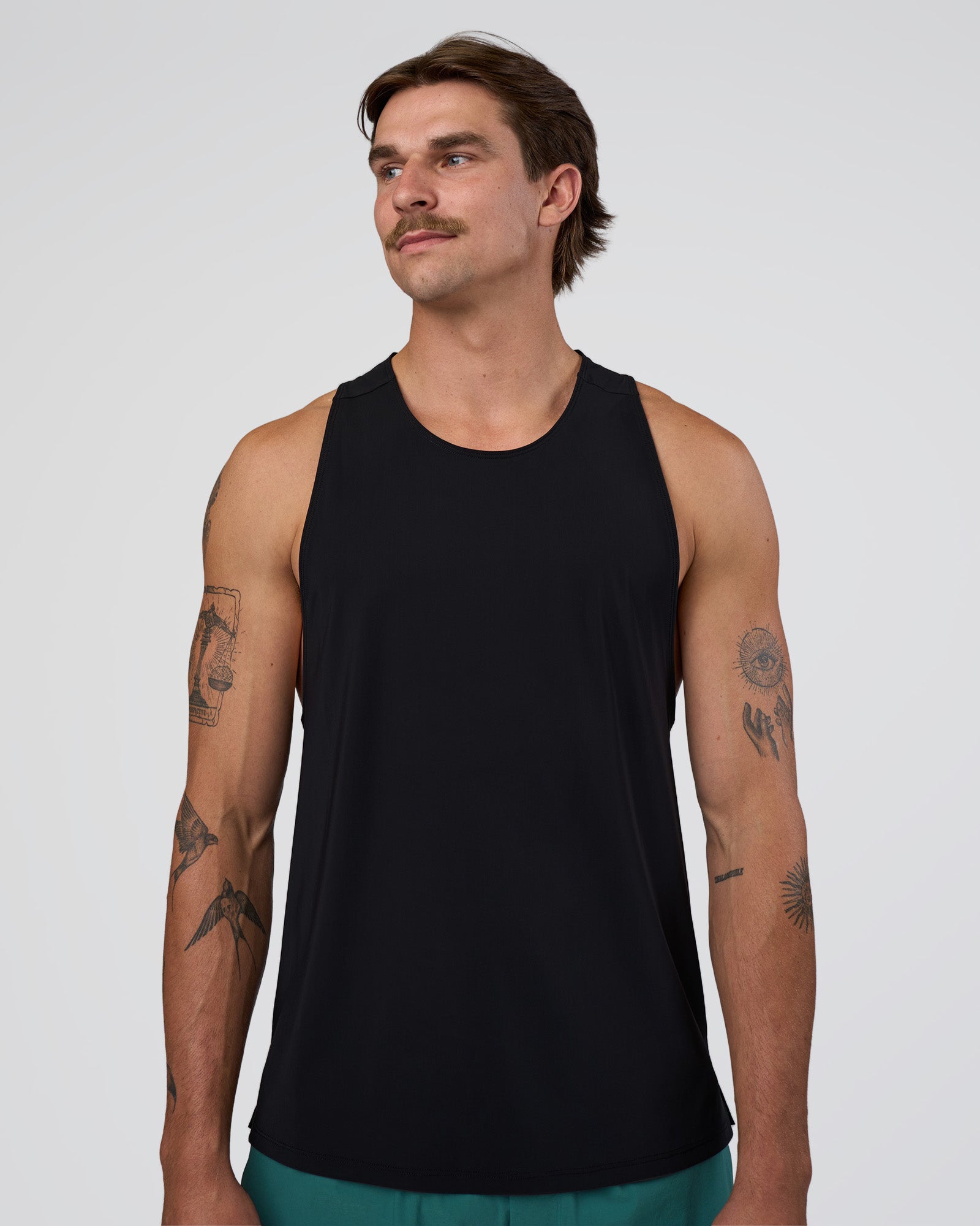 Man wearing Cadence Swift Tank - Black | Model:Konnor | Size:M