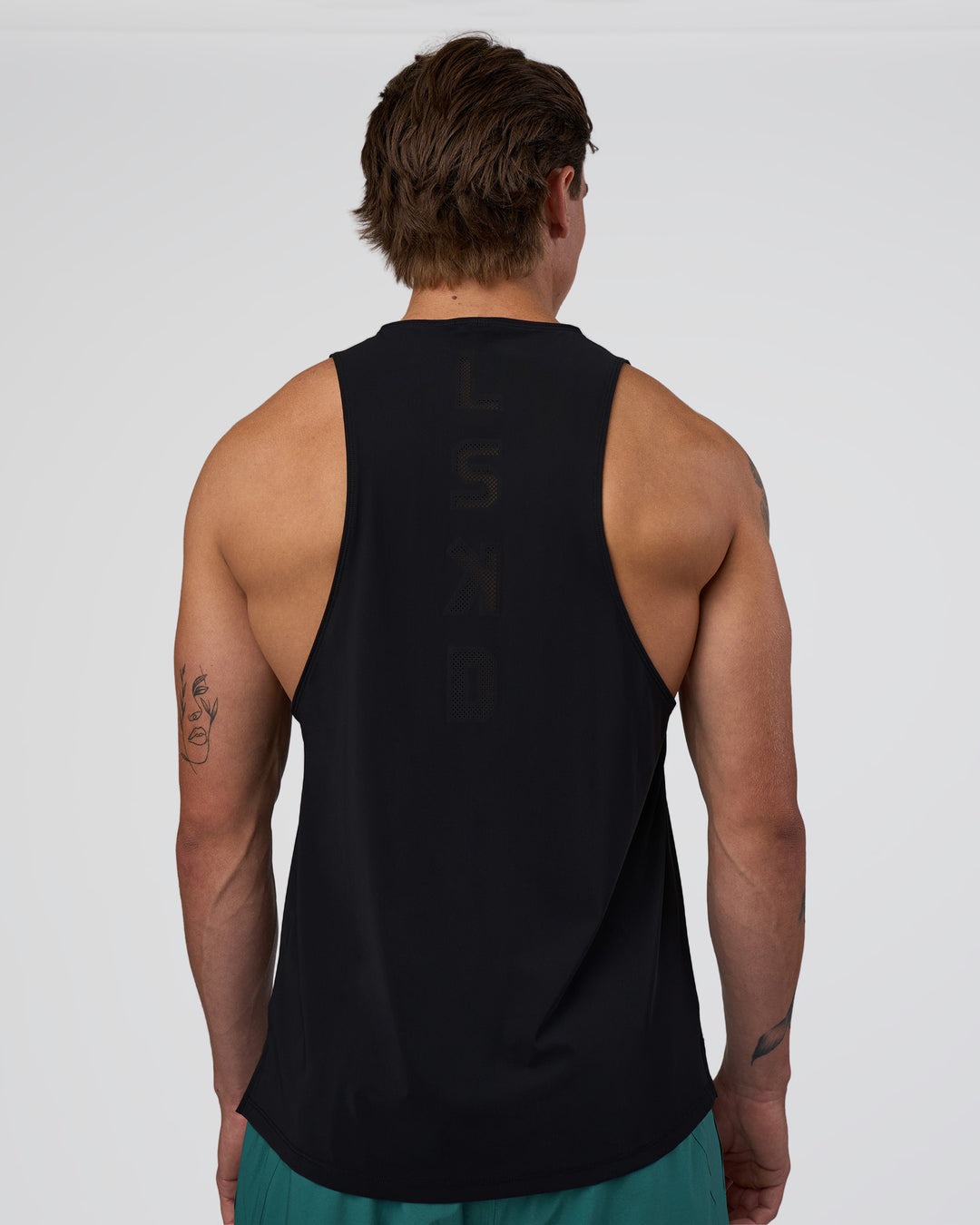 Man wearing Cadence Swift Tank - Black | Model:Konnor | Size:M