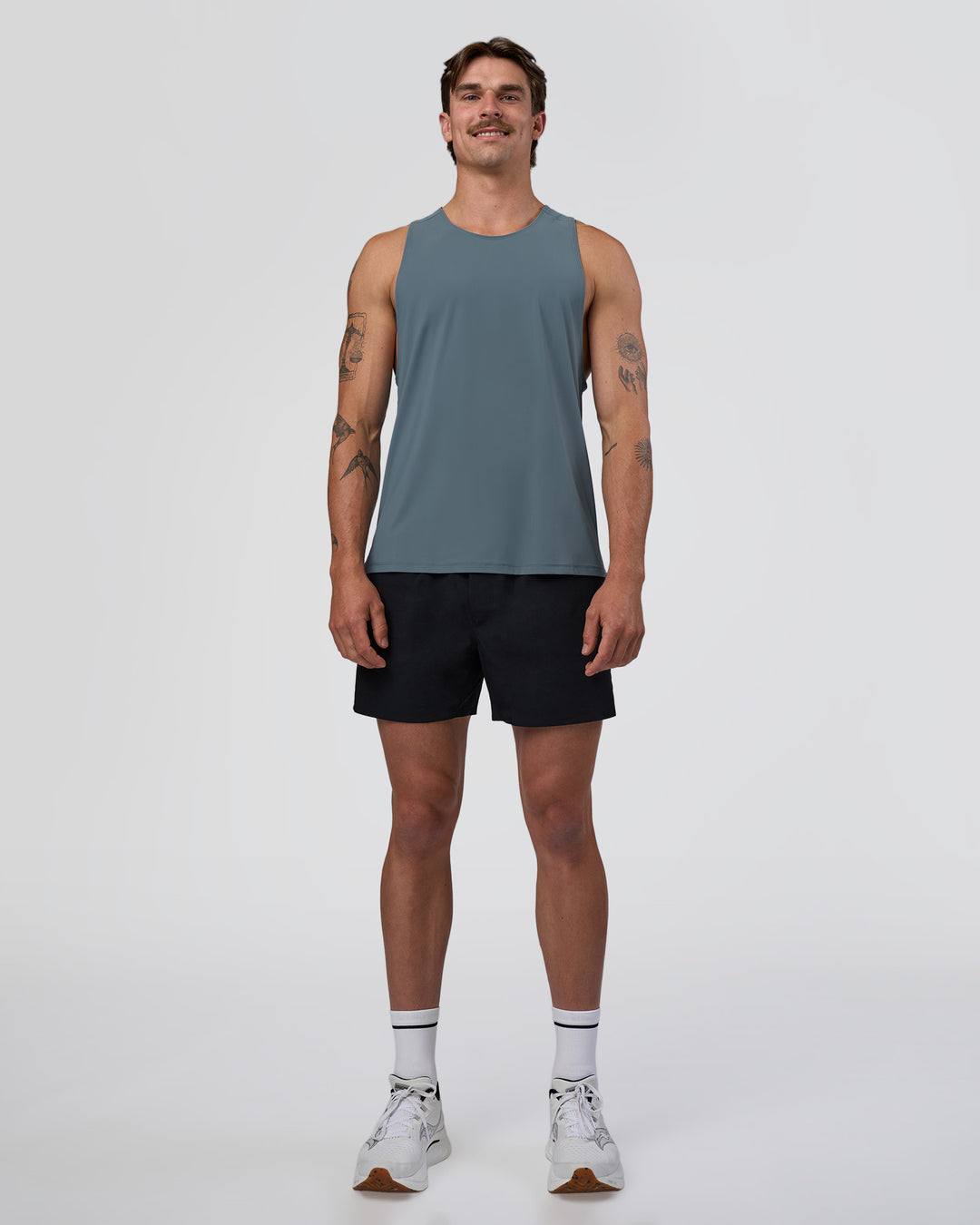 Man wearing Cadence Swift Tank - Blue Mirage | Model:Konnor | Size:M