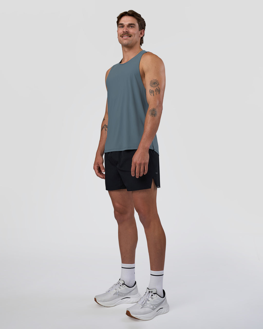 Man wearing Cadence Swift Tank - Blue Mirage | Model:Konnor | Size:M