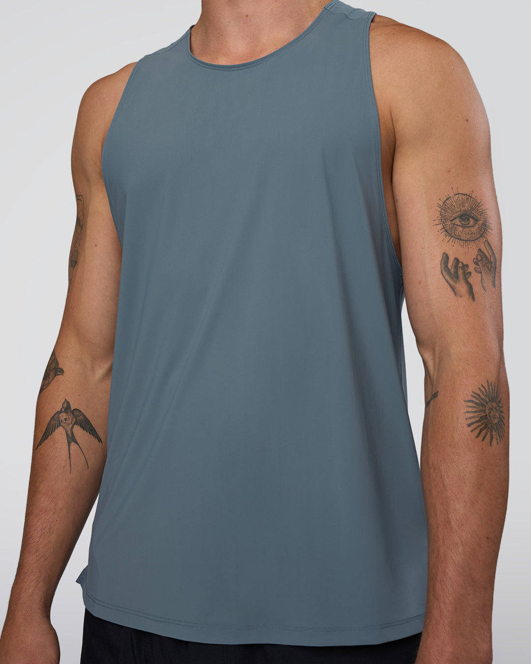 Man wearing Cadence Swift Tank - Blue Mirage | Model:Konnor | Size:M