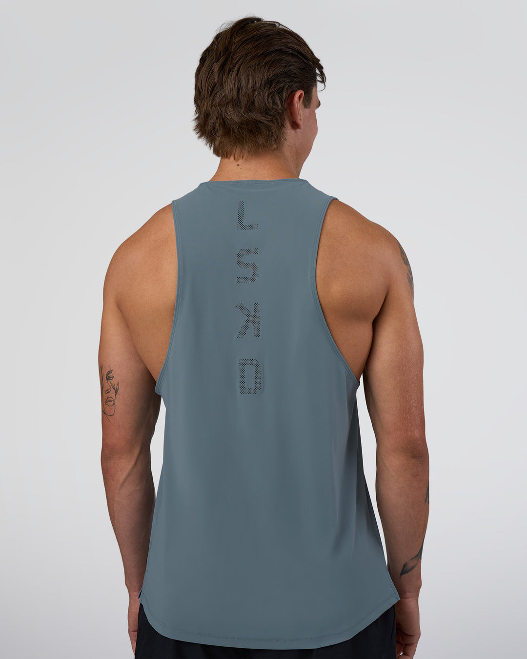 Man wearing Cadence Swift Tank - Blue Mirage | Model:Konnor | Size:M