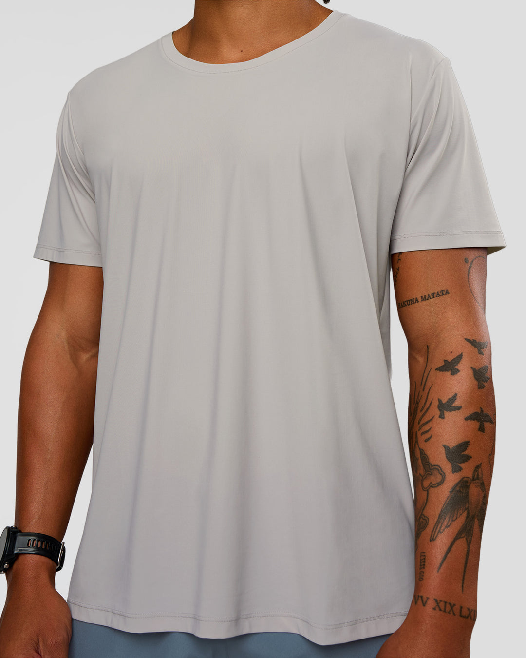 Man wearing Cadence Swift Tee - Alloy | Model:Malebo | Size:M
