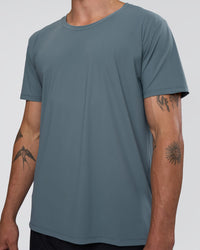 Man wearing Cadence Swift Tee - Blue Mirage | Model:Konnor | Size:M