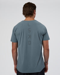 Man wearing Cadence Swift Tee - Blue Mirage | Model:Konnor | Size:M