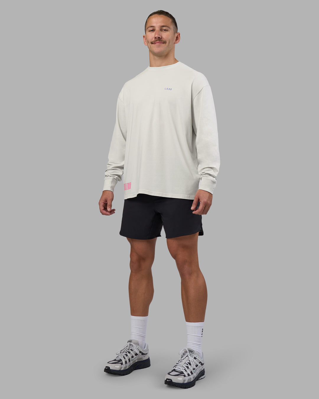 Man wearing Cali FLXCotton Oversized Long Sleeve Tee - Digital Mist Washed | Model:Jaiden | Size:M