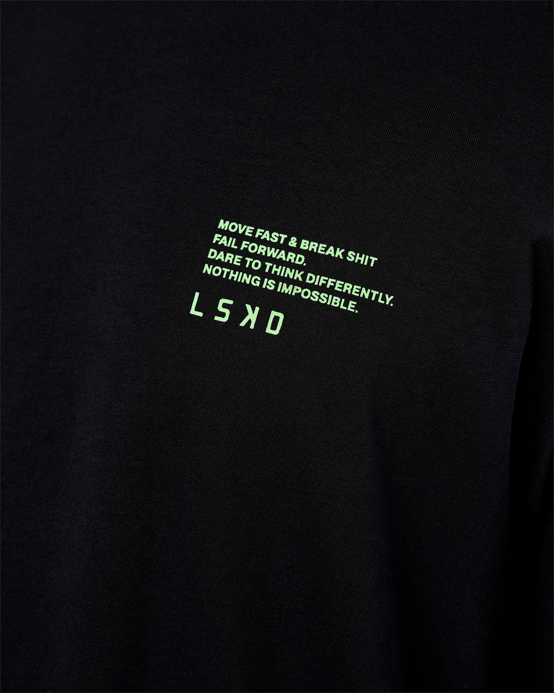 Man wearing Coffee Run FLXCotton Oversized Tee - Black-Solar Lime | Model:Zoran | Size:L