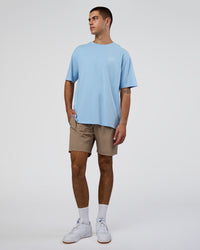 Man wearing Coffee Run FLXCotton Oversized Tee - Open Air-White | Model:Zoran | Size:L