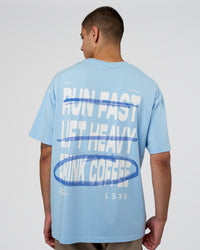 Man wearing Coffee Run FLXCotton Oversized Tee - Open Air-White | Model:Zoran | Size:L