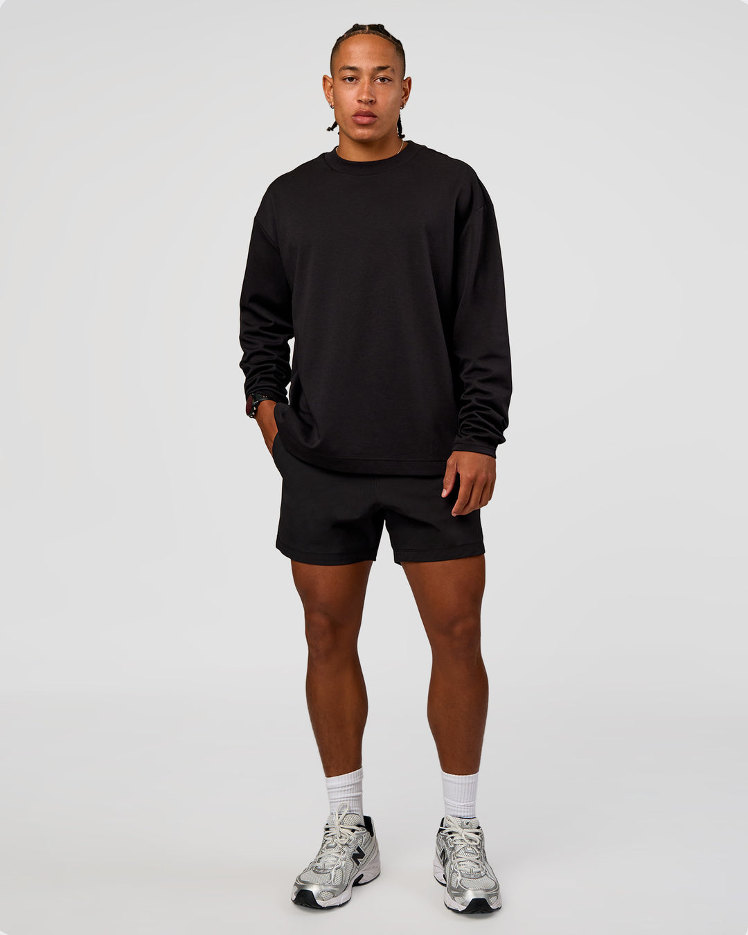 Man wearing Daily 5" Short 2.0 in Black | Model:Malebo | Size:M