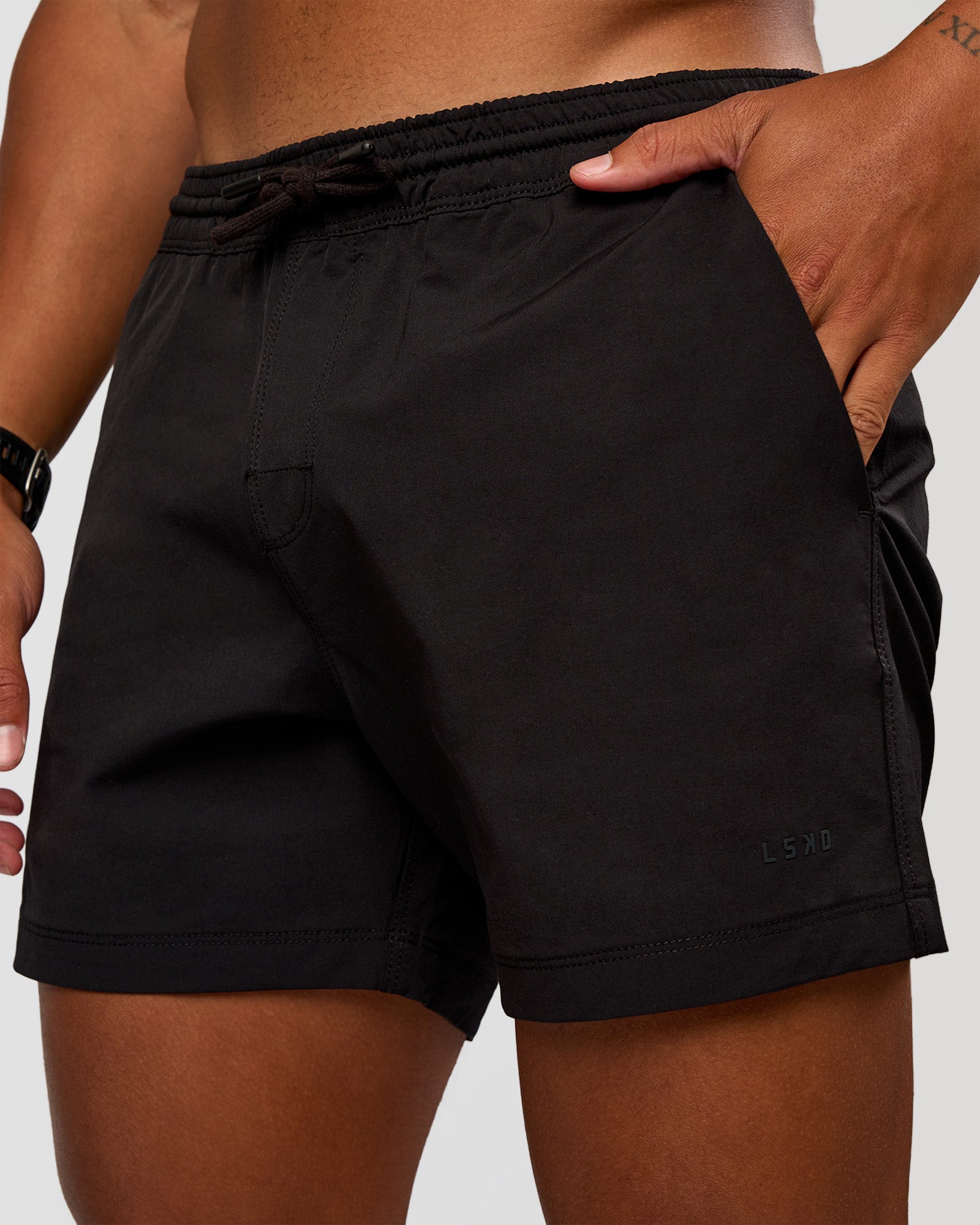 Man wearing Daily 5" Short 2.0 in Black | Model:Malebo | Size:M