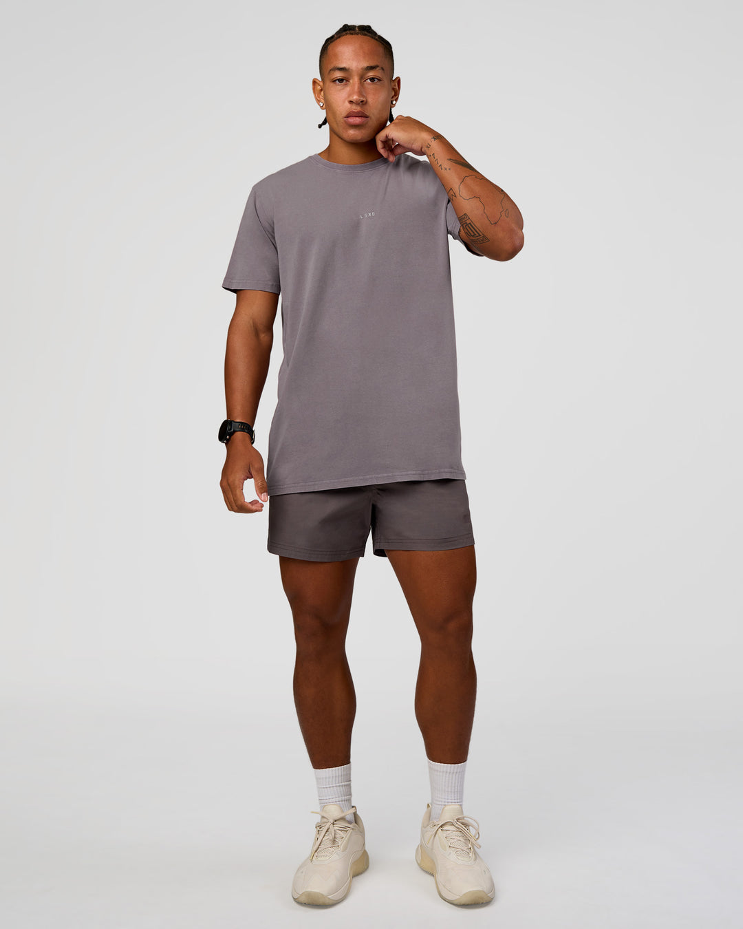Man wearing Daily 5" Short - Duskstone | Model:Malebo | Size:M
