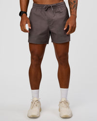 Man wearing Daily 5" Short - Duskstone | Model:Malebo | Size:M