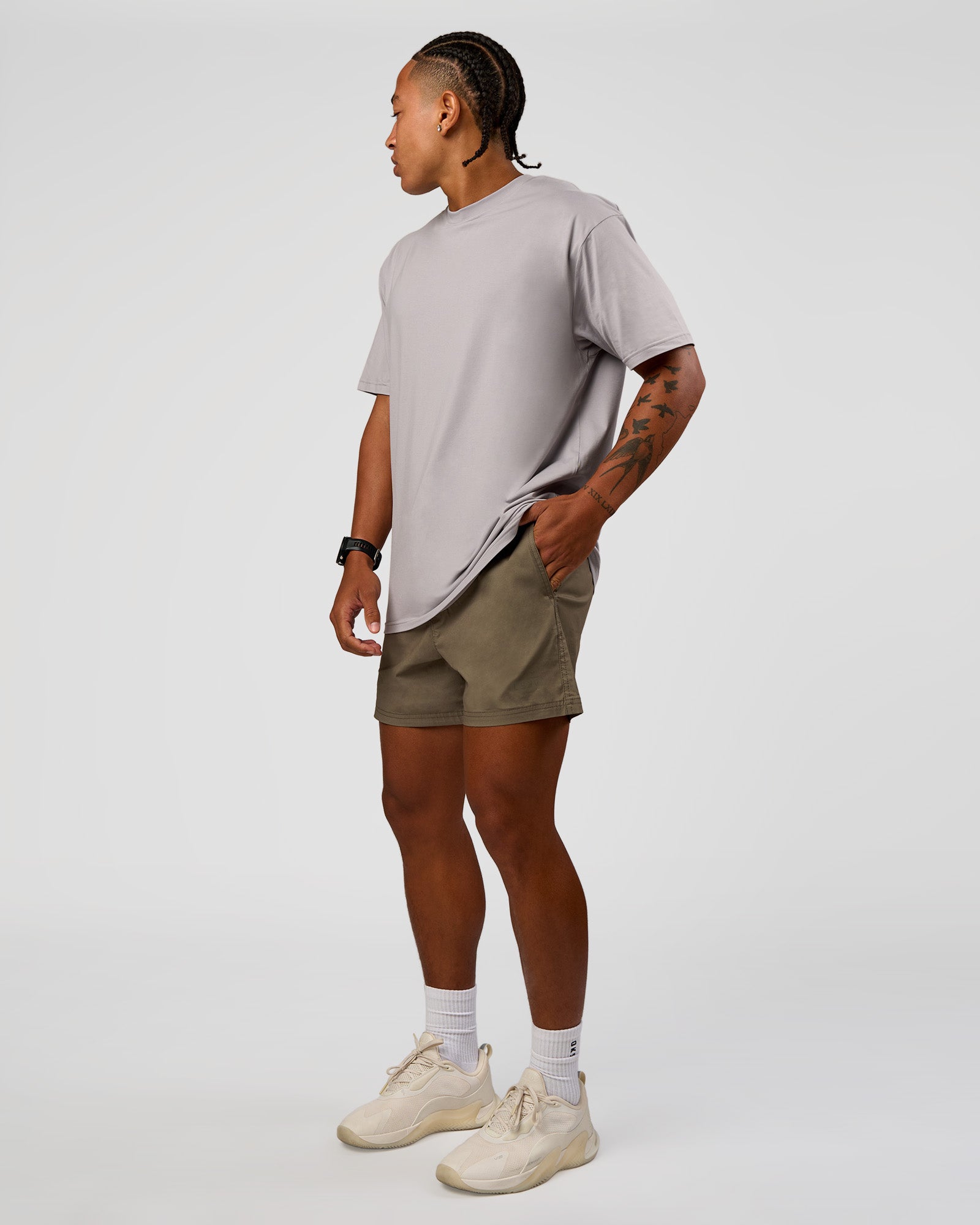 Man wearing Daily 5" Short - Walnut Grey | Model:Malebo | Size:M