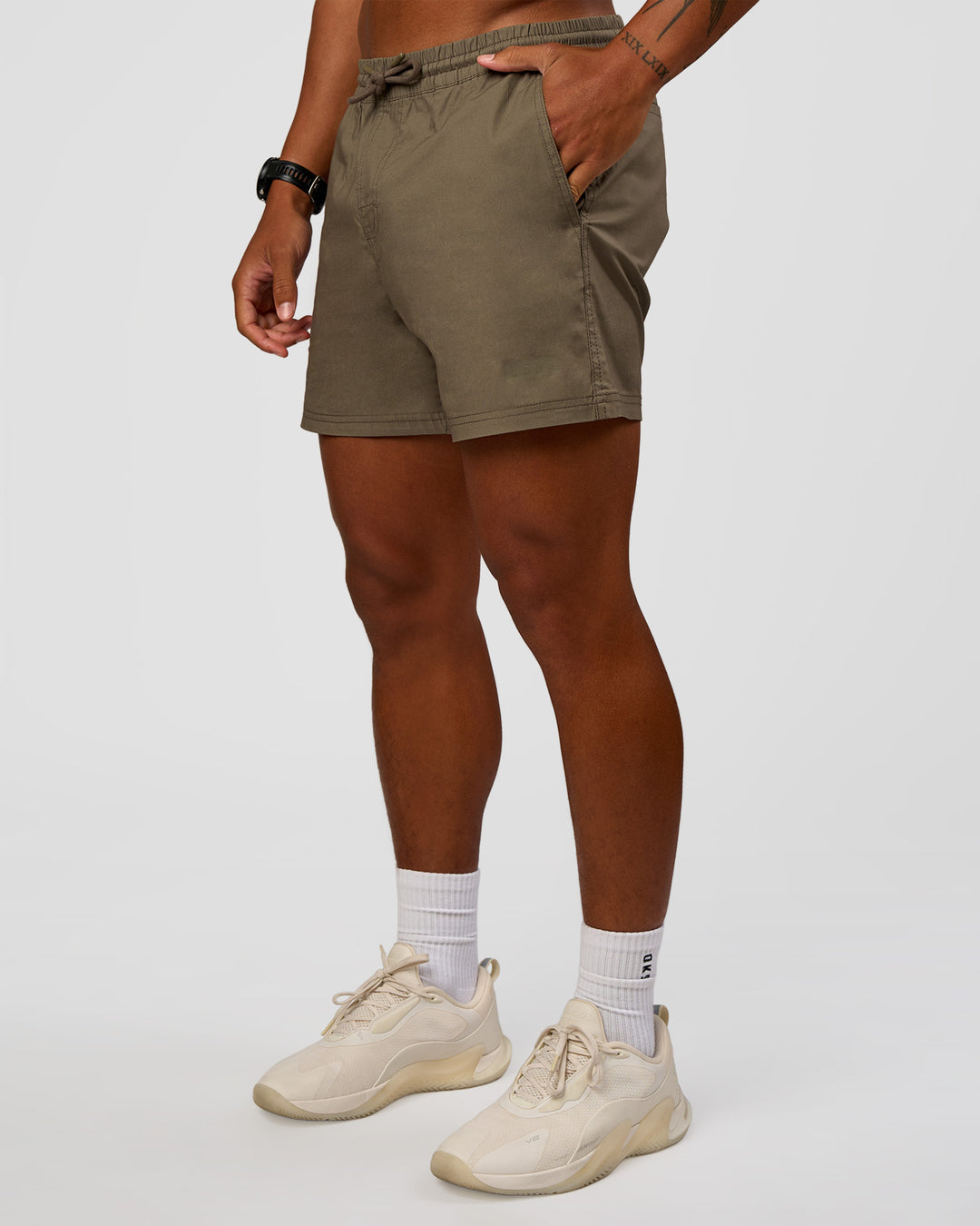 Man wearing Daily 5" Short - Walnut Grey | Model:Malebo | Size:M