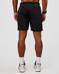 Man wearing Daily 7" Short 2.0 in  Black | Model:Malebo | Size:M