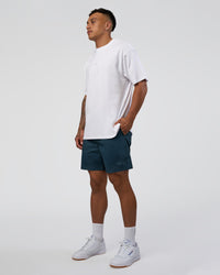 Man wearing Daily 7" Short - Night Sea | Model:Daarian | Size:M