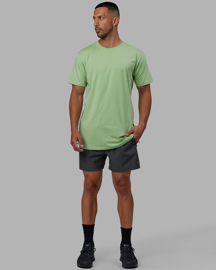 Man wearing Deluxe PimaFLX Tee - Green Fig