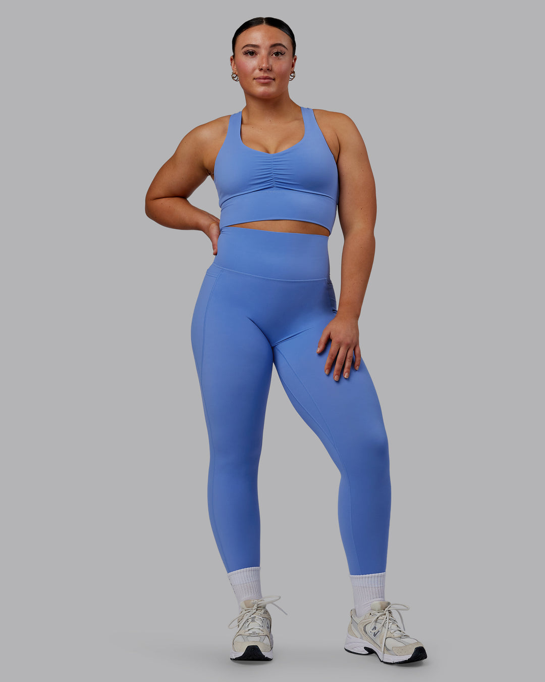 Woman wearing Elixir Ultra High-Rise 7/8 Legging Pockets - Ultramarine | Model:Bronty | Size:M