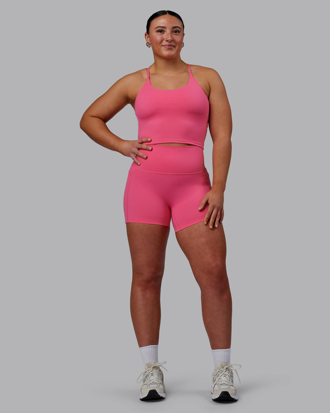 Woman wearing Elixir Active Tank - Carmine Rose