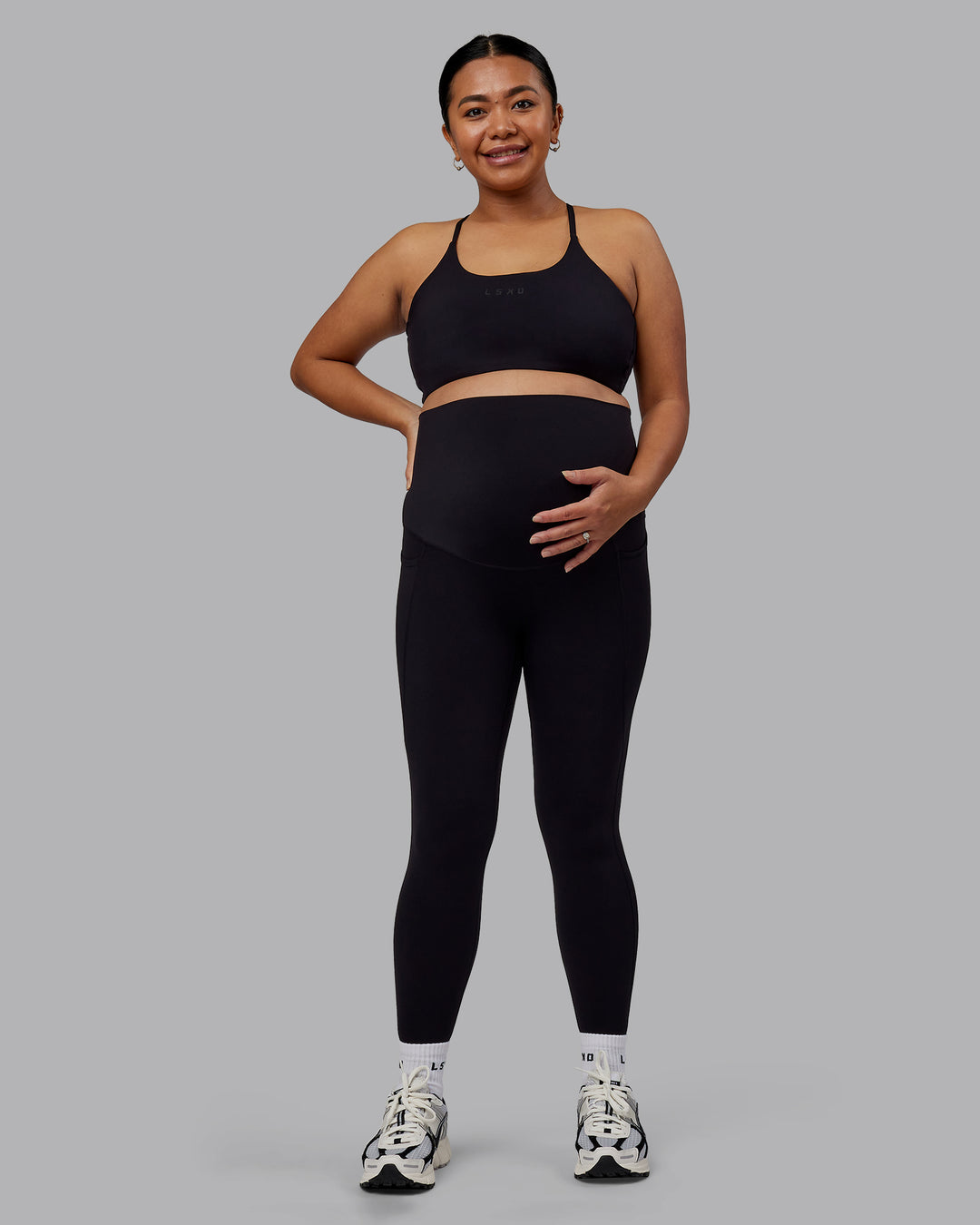 Woman wearing Elixir Ultra High-Rise Maternity Full Length Legging Pockets - Black | Model:Jojo | Size:M