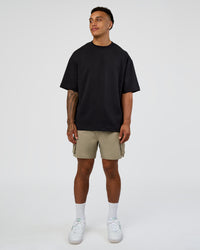 Man wearing Energy Stretch 6" Performance Cargo Short - Laurel Oak | Model:Daarian | Size:M