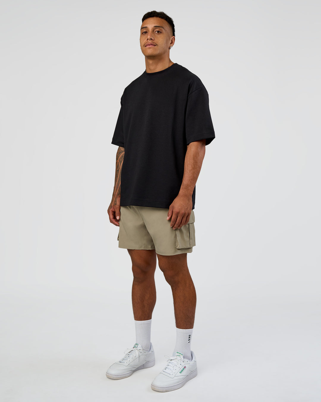 Man wearing Energy Stretch 6" Performance Cargo Short - Laurel Oak | Model:Daarian | Size:M