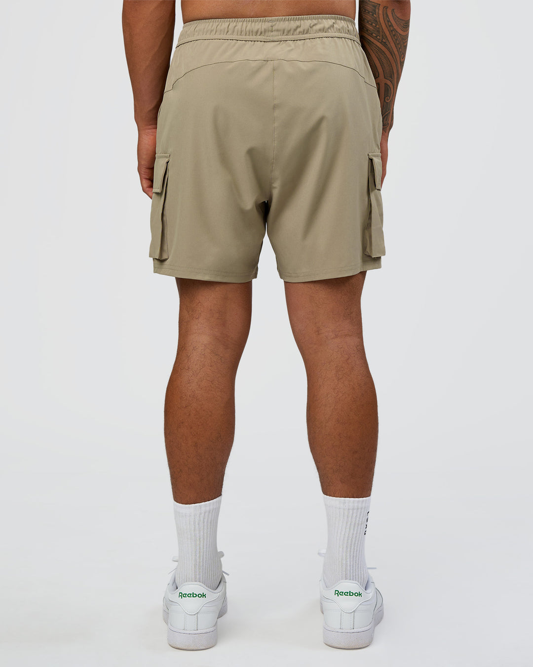 Man wearing Energy Stretch 6" Performance Cargo Short - Laurel Oak | Model:Daarian | Size:M