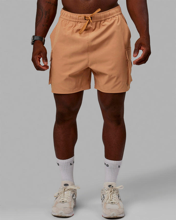 Man wearing Energy Stretch Performance Cargo Shorts - Latte