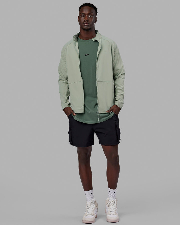 Man wearing Energy Stretch Performance Jacket - Iceberg Green