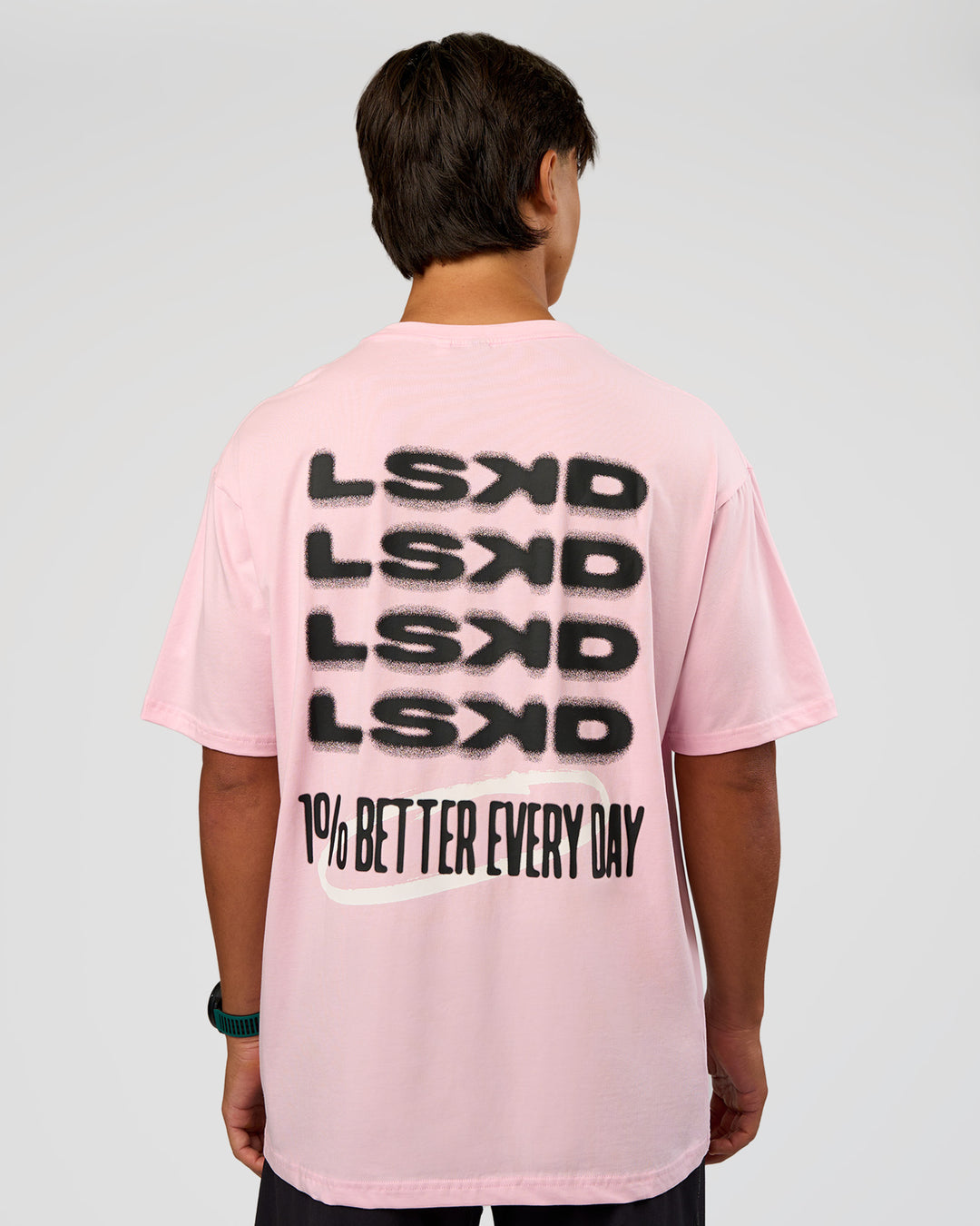 Man wearing Everyday Elevation FLXCotton Oversized Tee - Marshmallow-Black | Model:George | Size:M