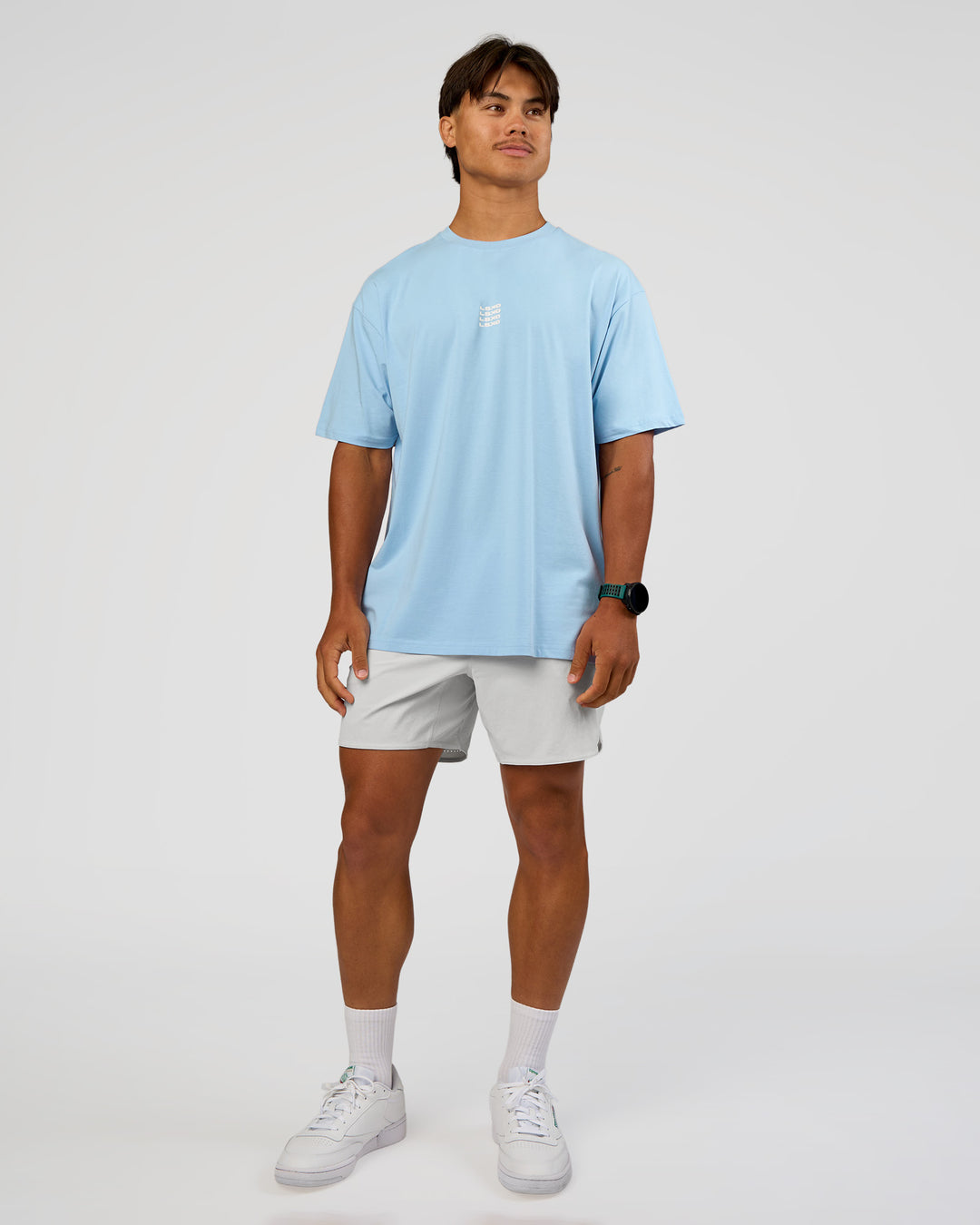 Man wearing Everyday Elevation FLXCotton Oversized Tee - Open Air-Off White | Model:George | Size:M
