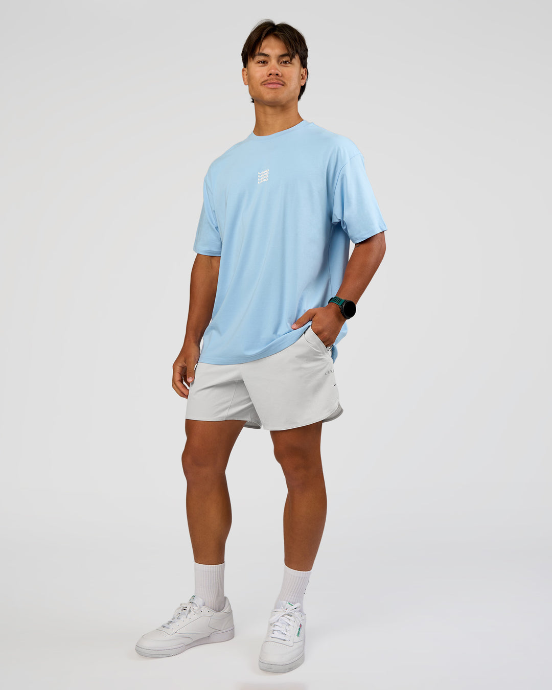 Man wearing Everyday Elevation FLXCotton Oversized Tee - Open Air-Off White | Model:George | Size:M