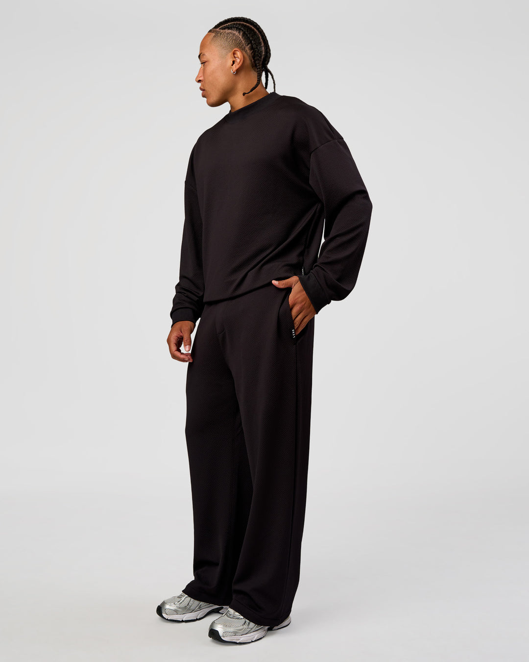 Man wearing Everyday Elevation Waffle Oversized Sweater - Black | Model:Malebo | Size:M