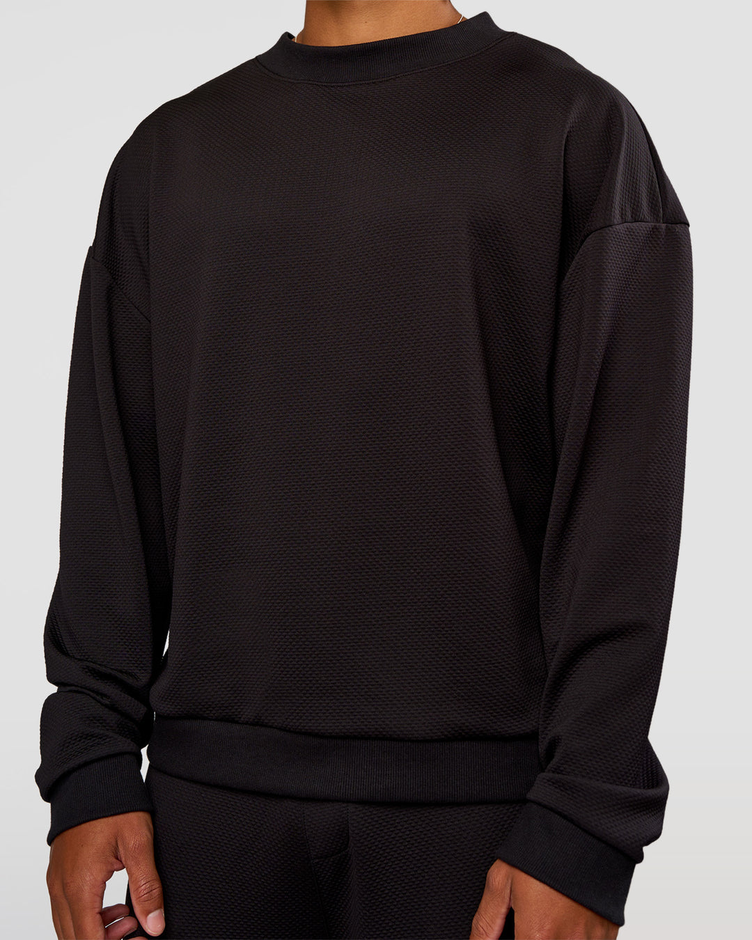 Man wearing Everyday Elevation Waffle Oversized Sweater - Black | Model:Malebo | Size:M