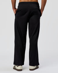Man wearing Everyday Elevation Waffle Wide Leg Pant - Black | Model:Albert | Size:M