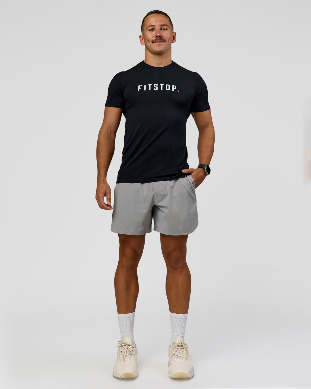 Man wearing Fitstop AeroFLX+ Seamless Tee - Black | Model:Jaiden | Size:M