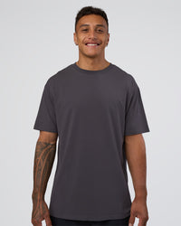 Man wearing Forever EffortlessTech Tee - Dark Storm | Model:Daarian | Size:M