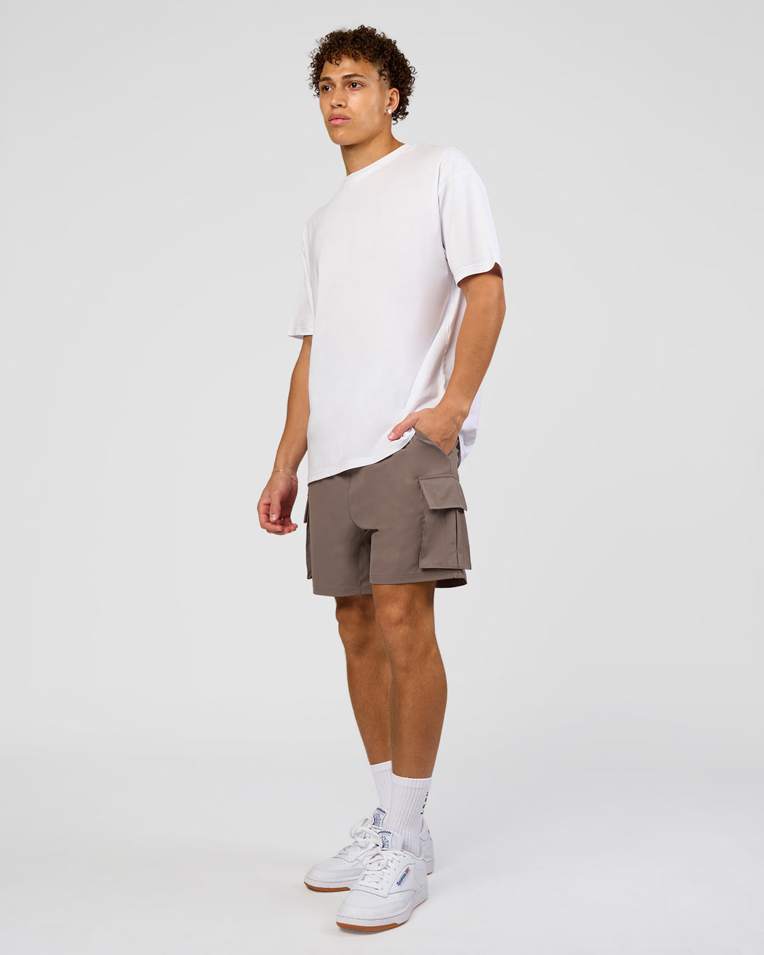 Man wearing Forever EffortlessTech Tee - White | Model:Leandro | Size:M