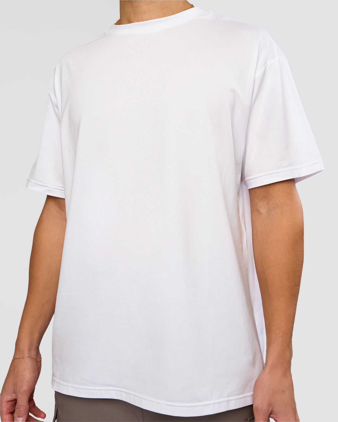 Man wearing Forever EffortlessTech Tee - White | Model:Leandro | Size:M