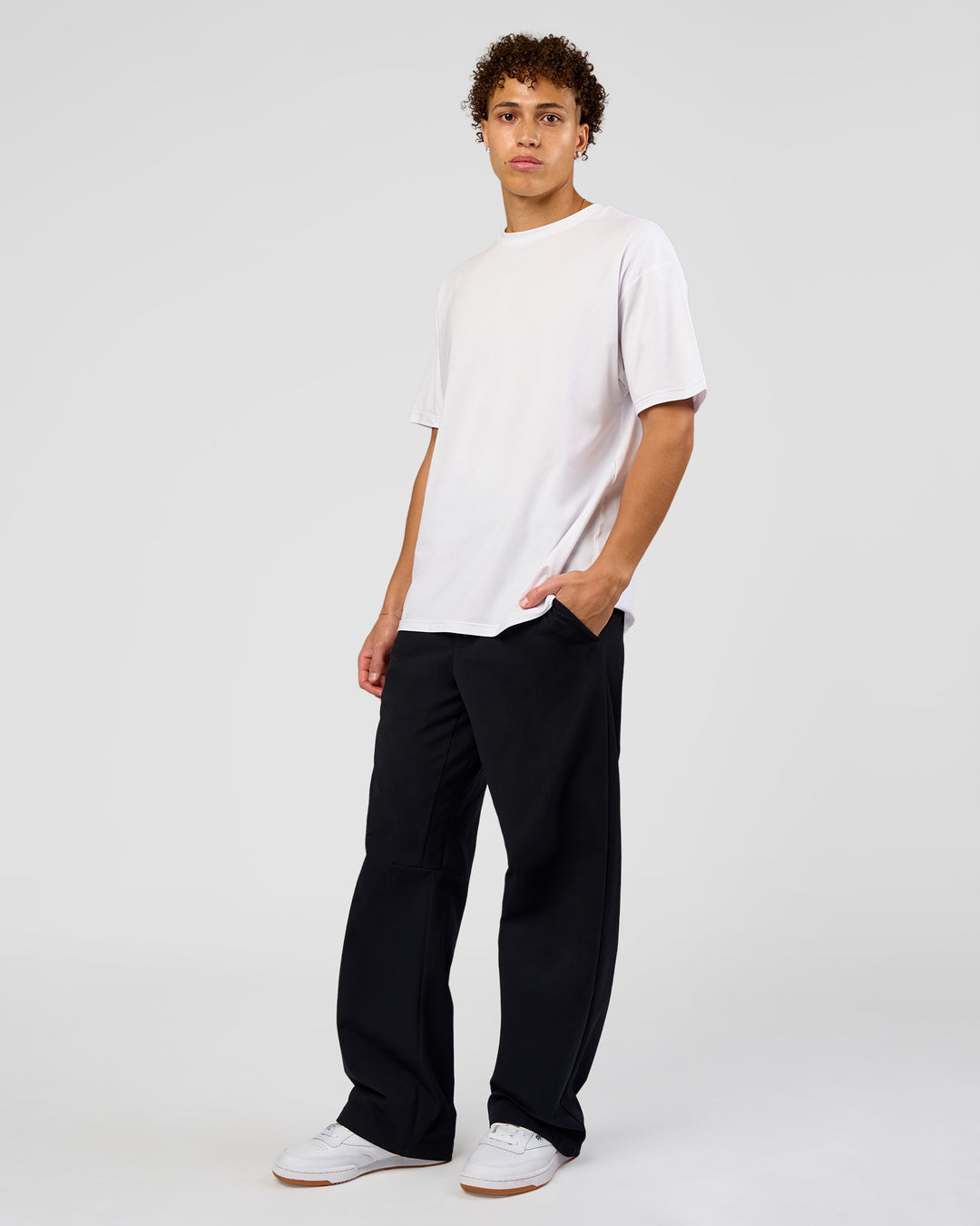 Man wearing Forever EffortlessTech Tee - White | Model:Leandro | Size:M
