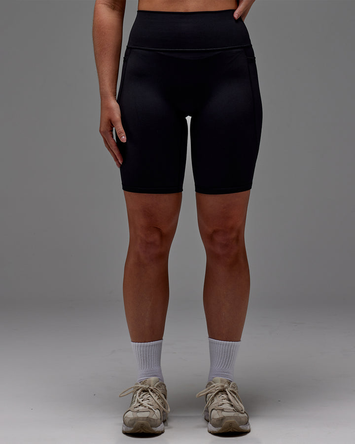 Woman wearing Fusion Bike Short With Pockets in Black | Model:Meg | Size:M
