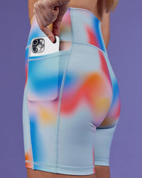 Woman wearing Fusion Ultra High-Rise 6" Short Pockets - Rainbow Shade | Set:true | Angle:closeup | Model:Mon | Size:M