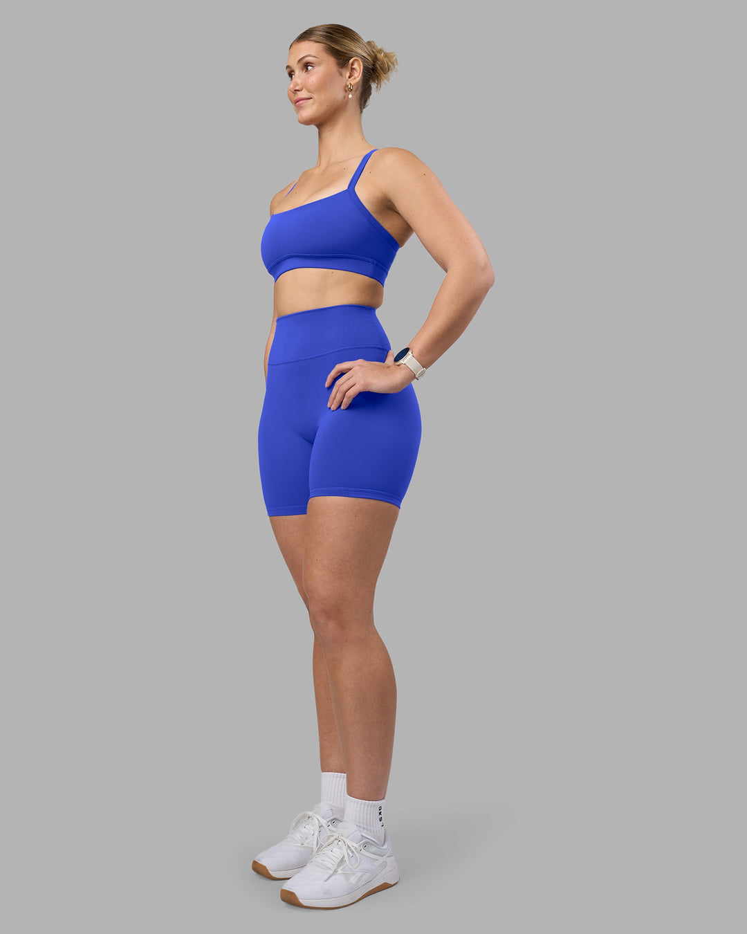 Woman wearing Fusion Ultra High-Rise 6&quot; Short - Power Cobalt | Model:Amy | Size:M