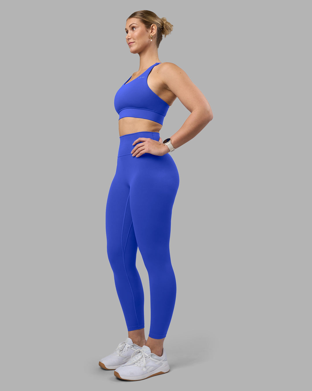 Woman wearing Fusion Ultra High-Rise 7/8 Legging - Power Cobalt | Model:Amy | Size:M