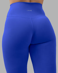 Woman wearing Fusion Ultra High-Rise 7/8 Legging - Power Cobalt | Model:Amy | Size:M