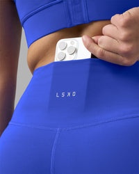 Woman wearing Fusion Ultra High-Rise 7/8 Legging - Power Cobalt | Model:Amy | Size:M